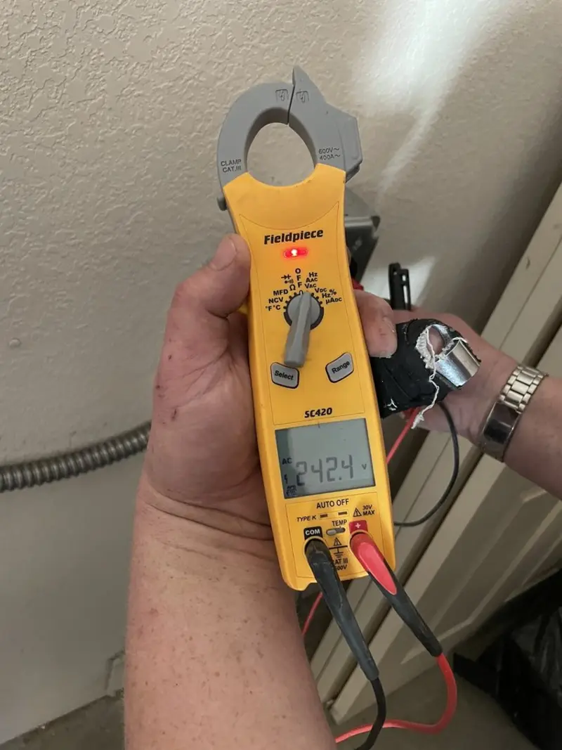 Voltage testing with clamp meter during Hot Tub / Pool Electrical Wiring in Cape Elizabeth